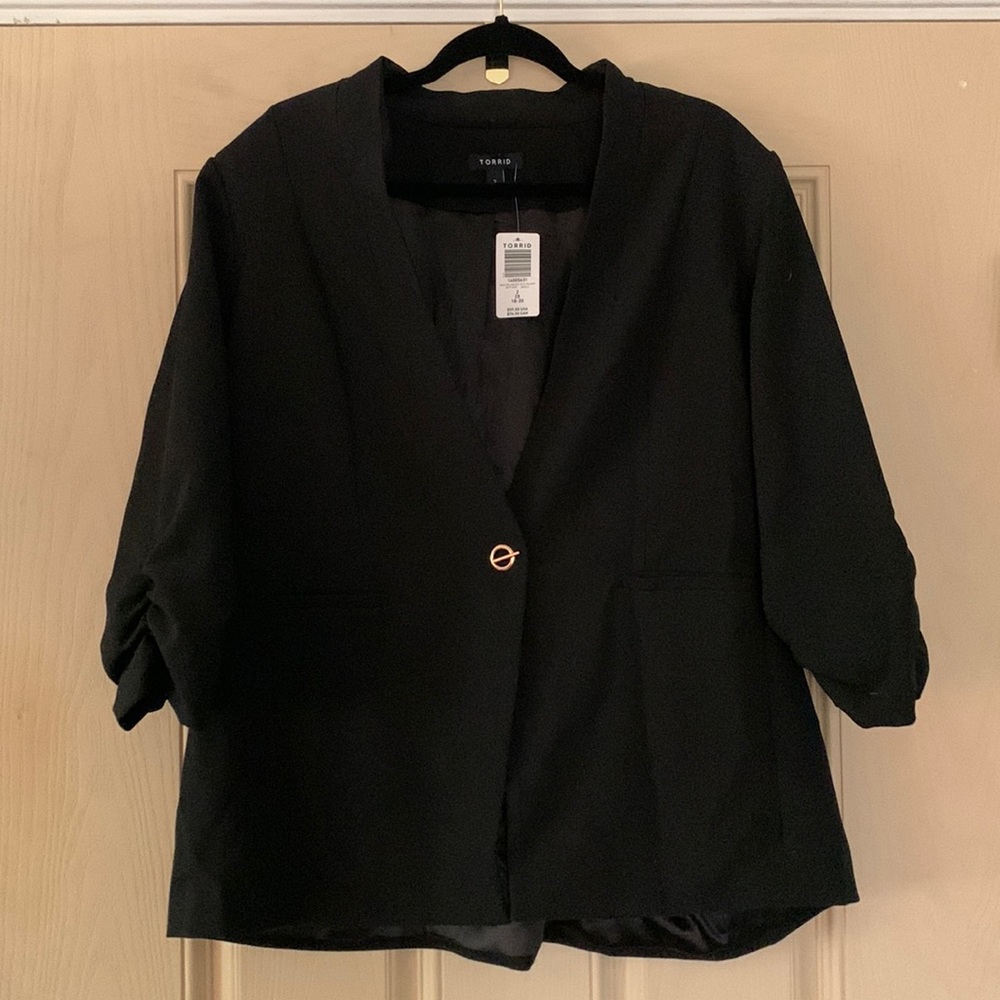 Black blazer with shoulder pads